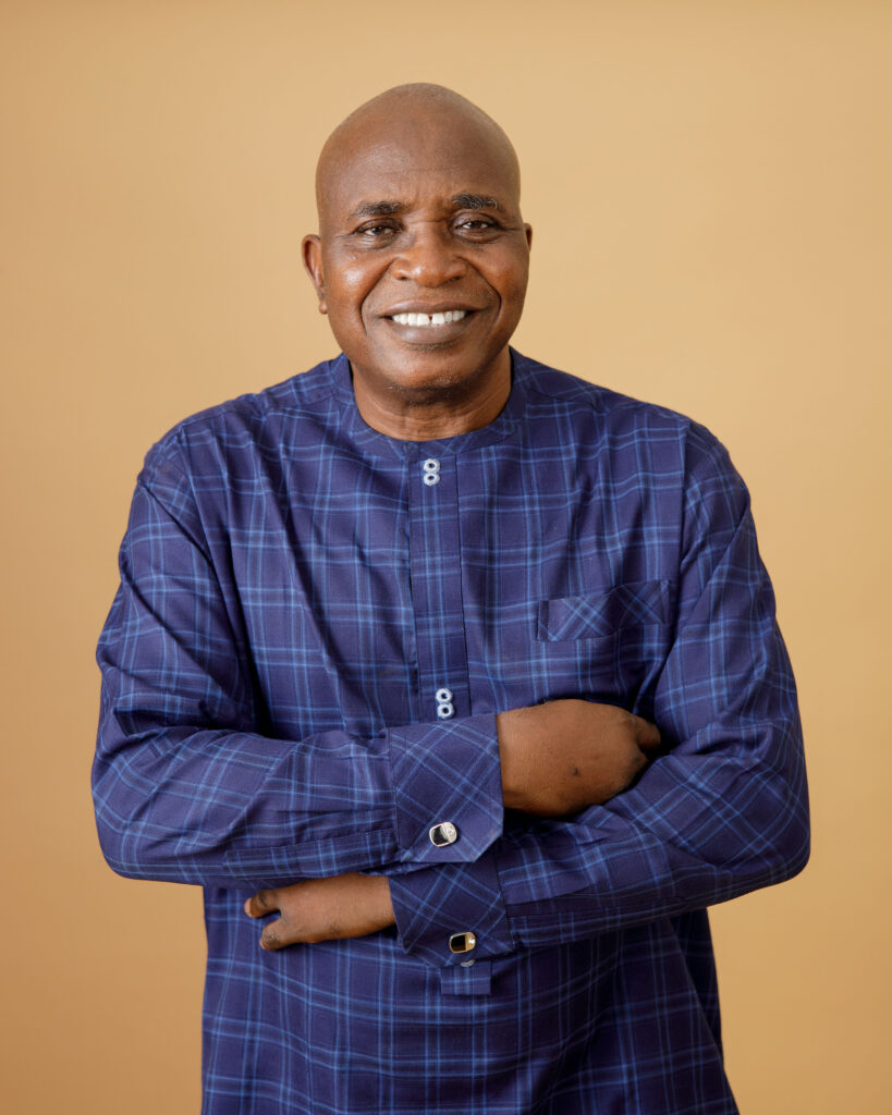 Dr. Raphael Olarewaju folded arms